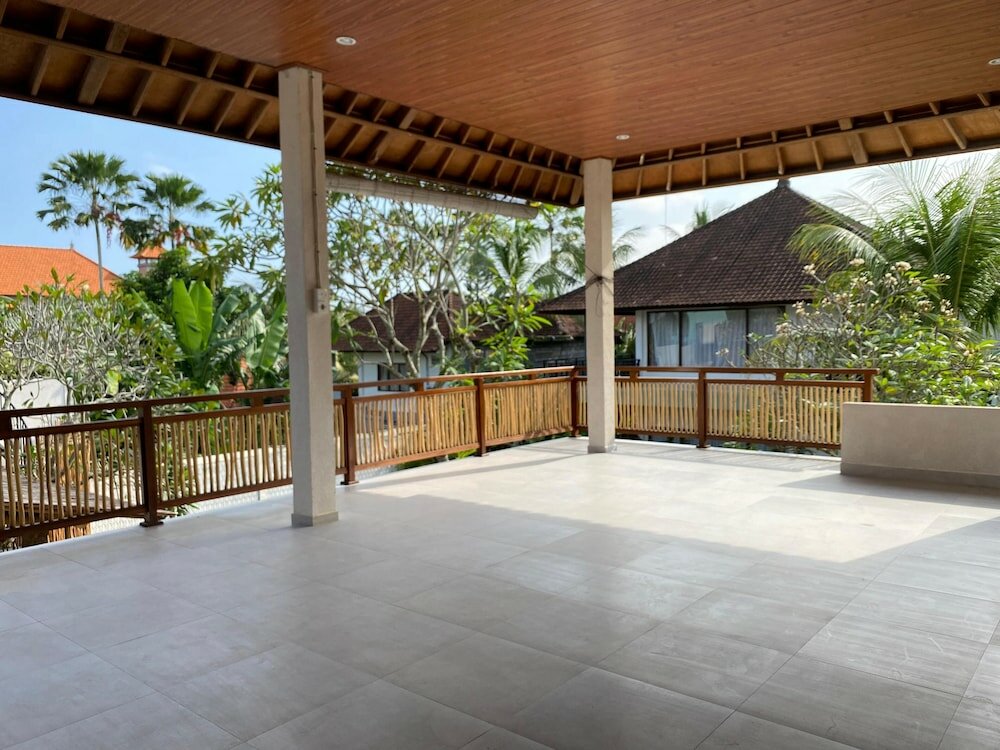 Фото Putri Ayu Cottages