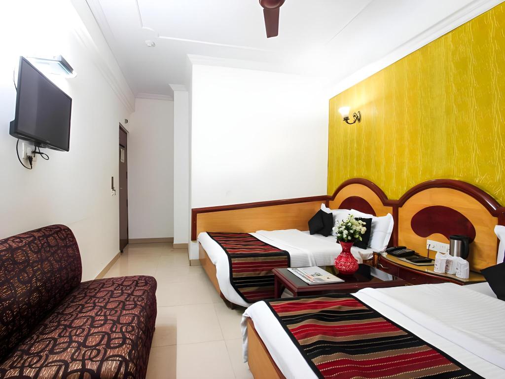 Фото Oyo 14710 Hotel Pallvi Palace