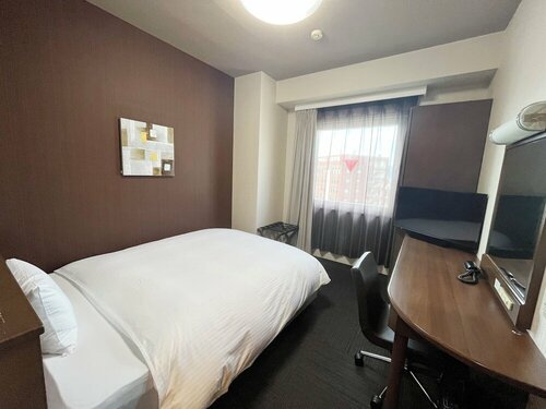 Гостиница Hotel Route-Inn Fukui Ekimae в Фукуи