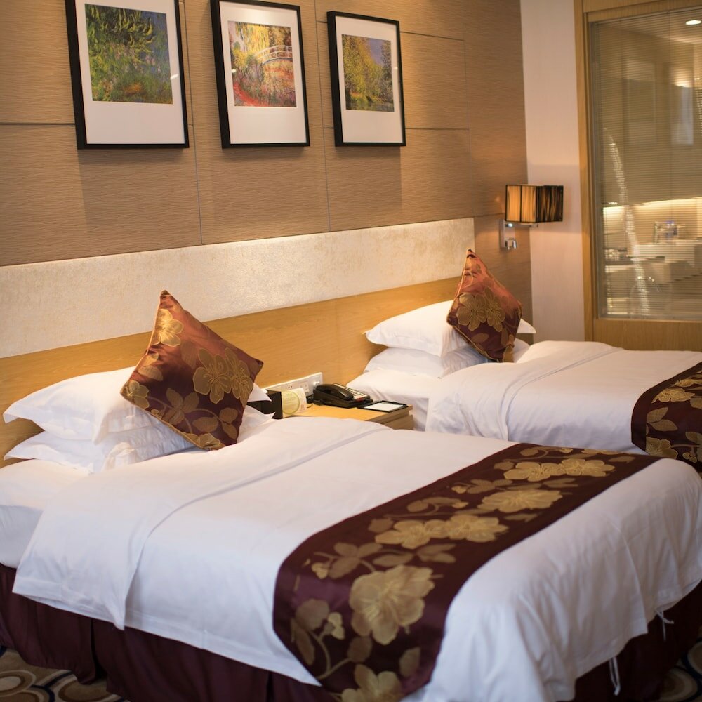 Фото Suzhou Sun Plaza Hotel