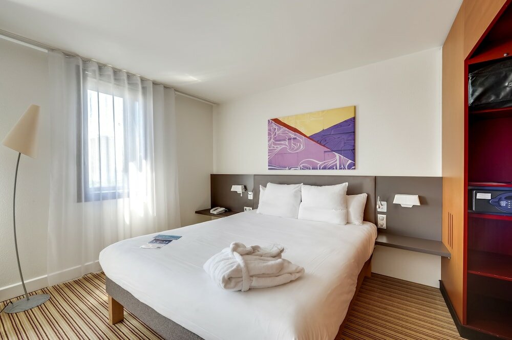 Фото Novotel Suites Paris Nord 18ème Hotel