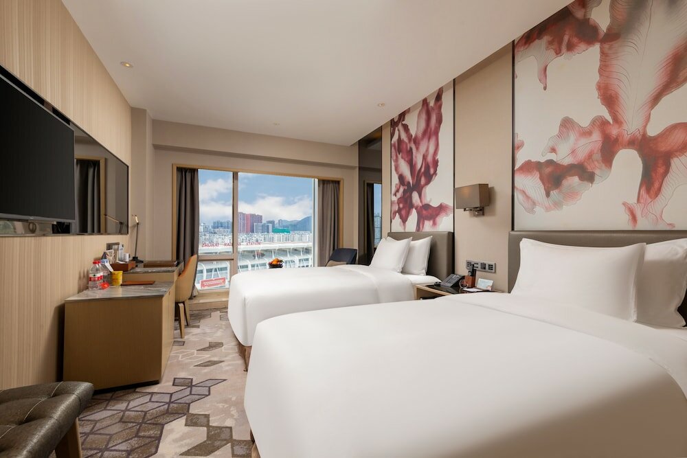 Фото Zhuhai LongZhuDa International Hotel
