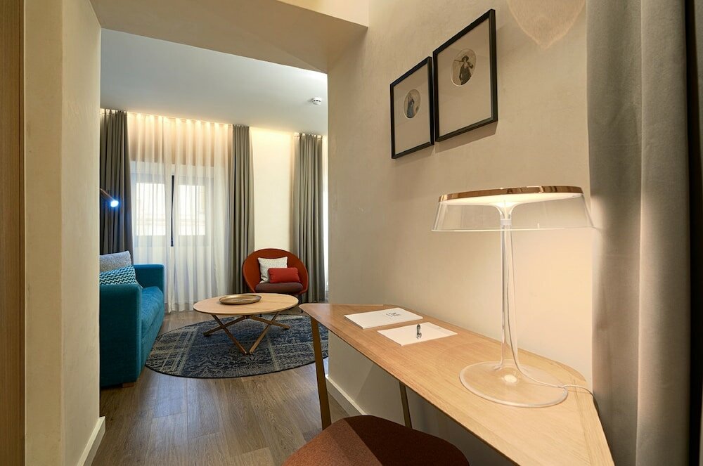 Фото Suites Murillo Plaza Sta Cruz