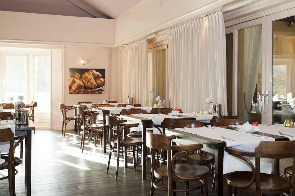 Фото Fletcher Hotel-Restaurant Heidehof