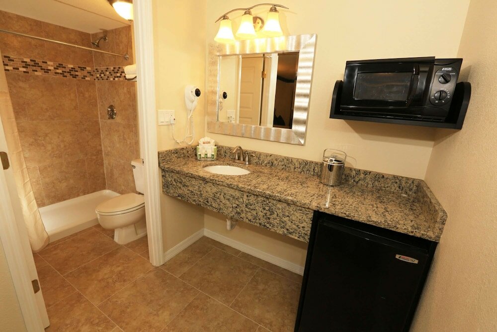 Фото SureStay Plus by Best Western Orlando International Drive