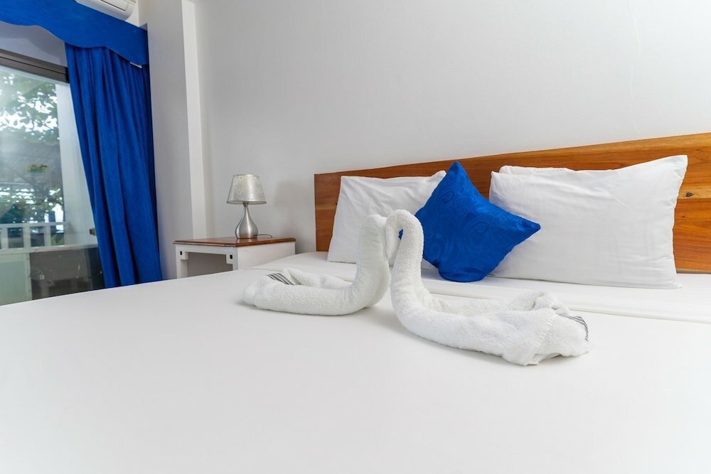 Фото Sand And Tan Beach Hotel