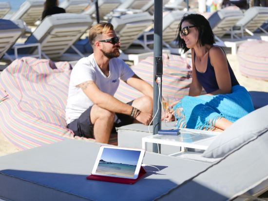 Фото Mykonos Dove Beachfront Hotel