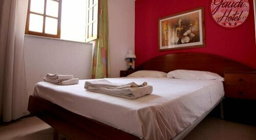 Гостиница Café Royal Suites в Минделу