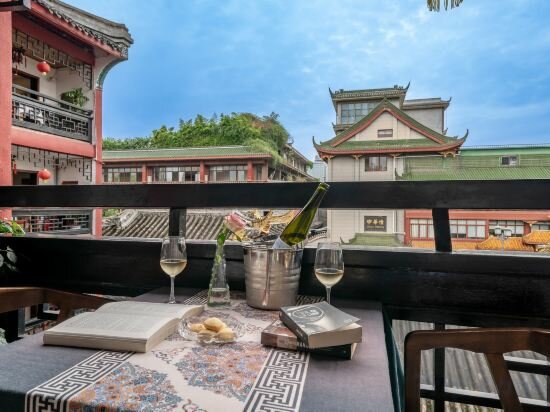 Фото Chengdu Wenjun courtyard Hotel