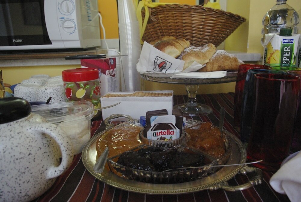 Фото B&b VIA Roma