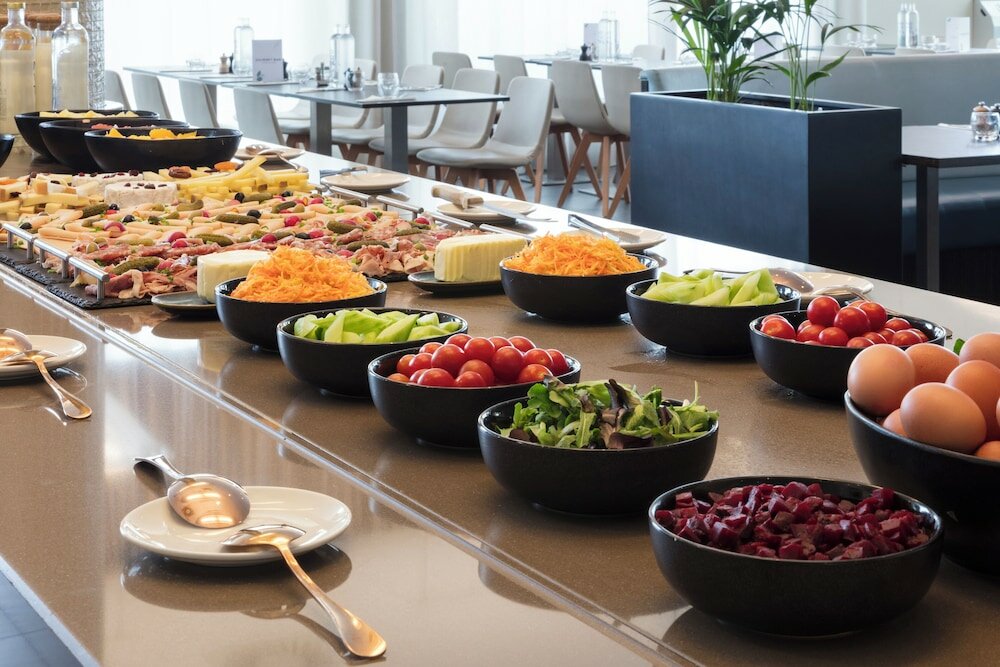 Фото Novotel Paris Saint Denis Stade Basilique