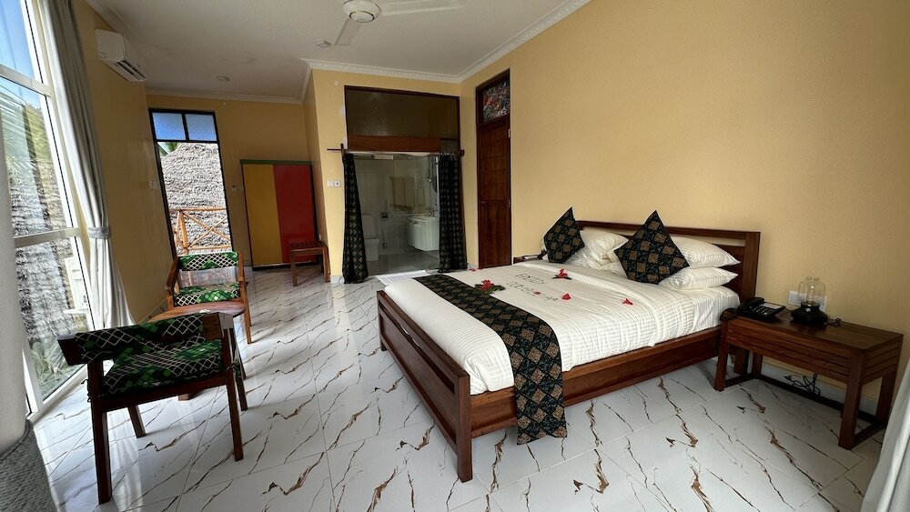 Фото Double A Nungwi Beach Hotel