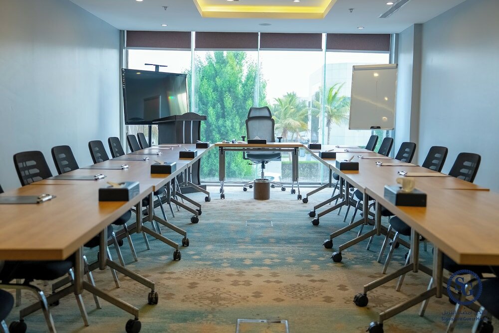 Фото Signature Guest Hotel