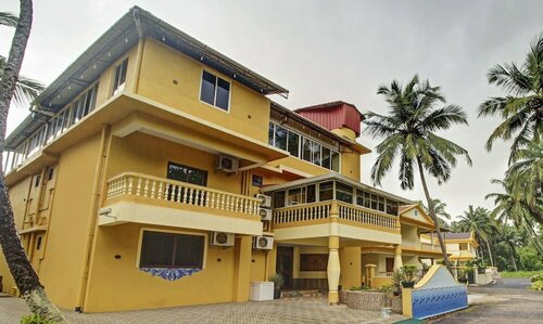 Гостиница Treebo Trend Majestic Palms в Бенаулиме