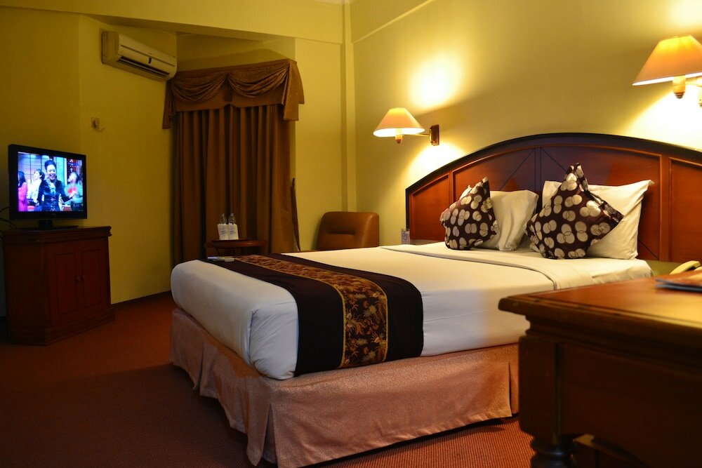 Фото Mega Matra Hotel