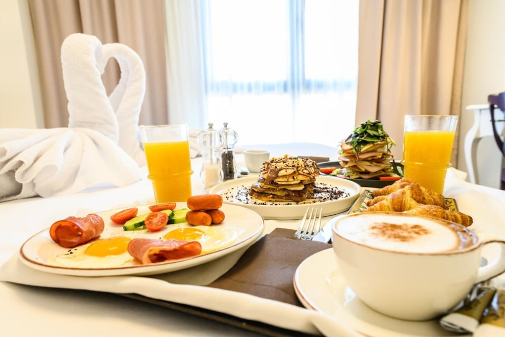 Фото Emerald Suites