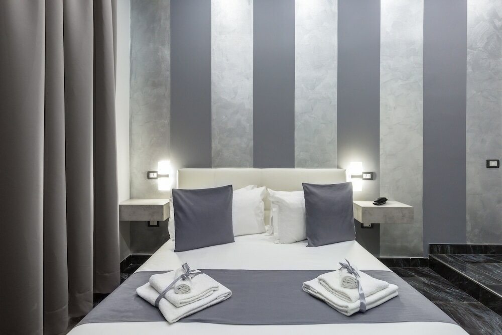 Фото Hotel Bella Napoli Suites