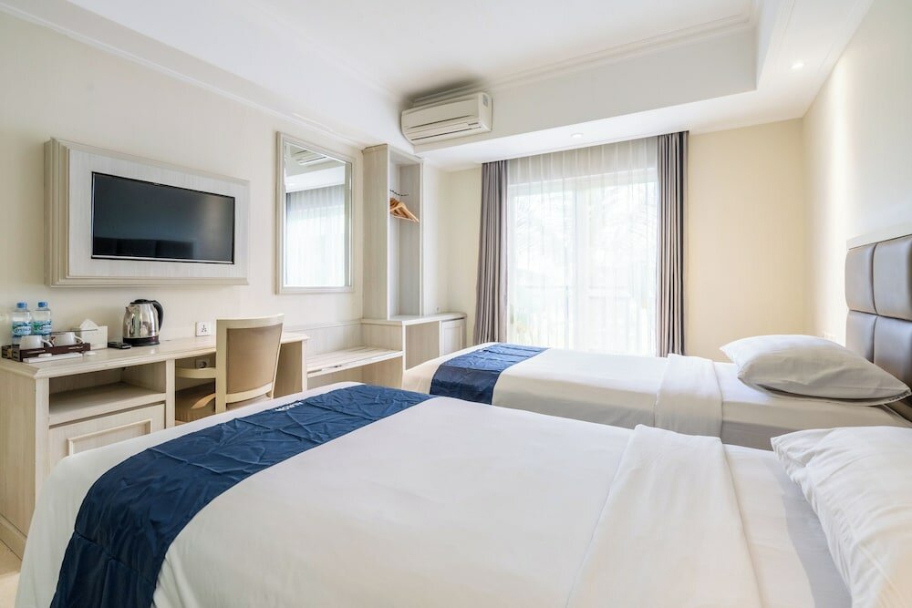 Фото Alron Hotel Kuta Powered by Archipelago