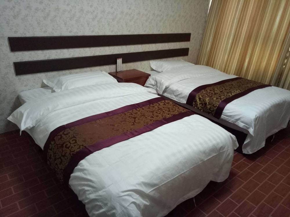 Фото Huayun Business Hotel