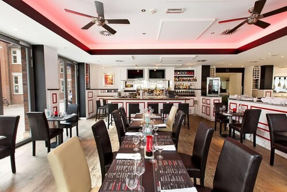 Фото Dormero Hotel Altes Kaufhaus Lüneburg