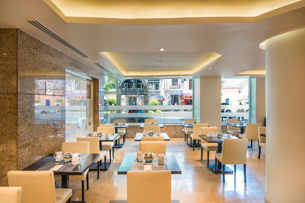 Фото Eurostars Zona Rosa Suites