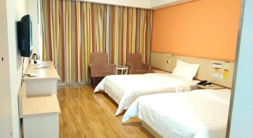 Фото 7Days Inn Chain Hotel Chongqing Wanzhou Gaosuntang Chongbai