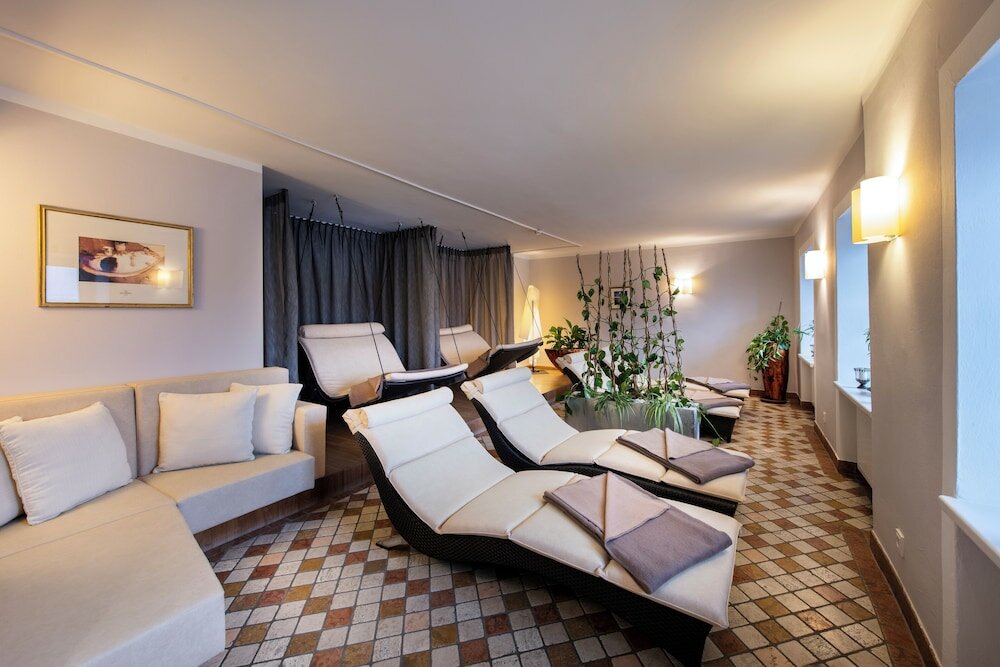Фото Romantik Residenz Ferienwohnungen Hotel Im Weissen Rössl