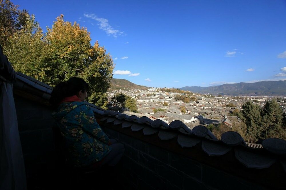 Фото Merry Inn Lijiang
