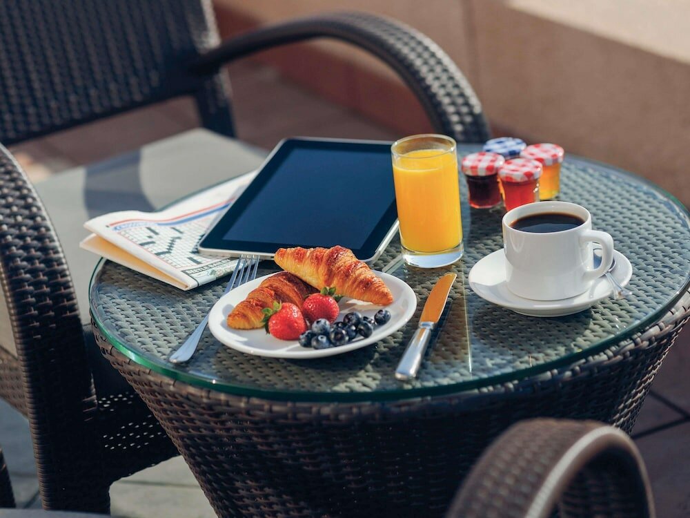 Фото Movenpick Ambassador Hotel