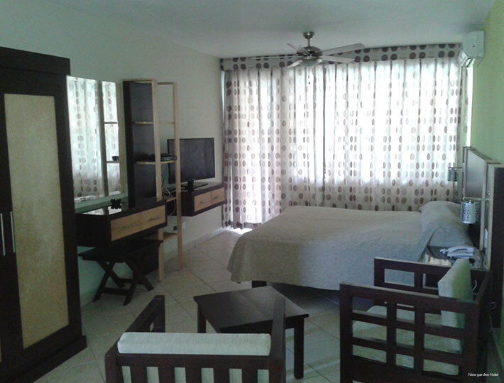 Фото New Garden Hotel