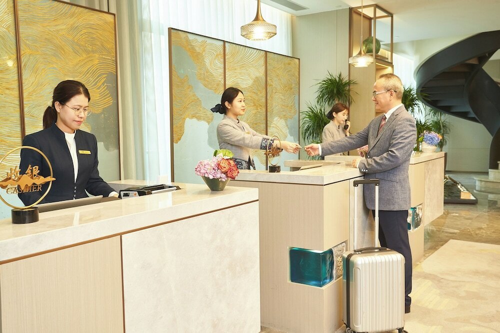 Фото Ln Dongfang Hotel Pazhou