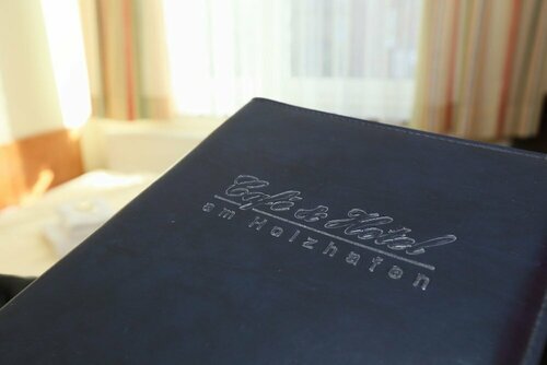Гостиница Café & Hotel am Holzhafen в Штаде