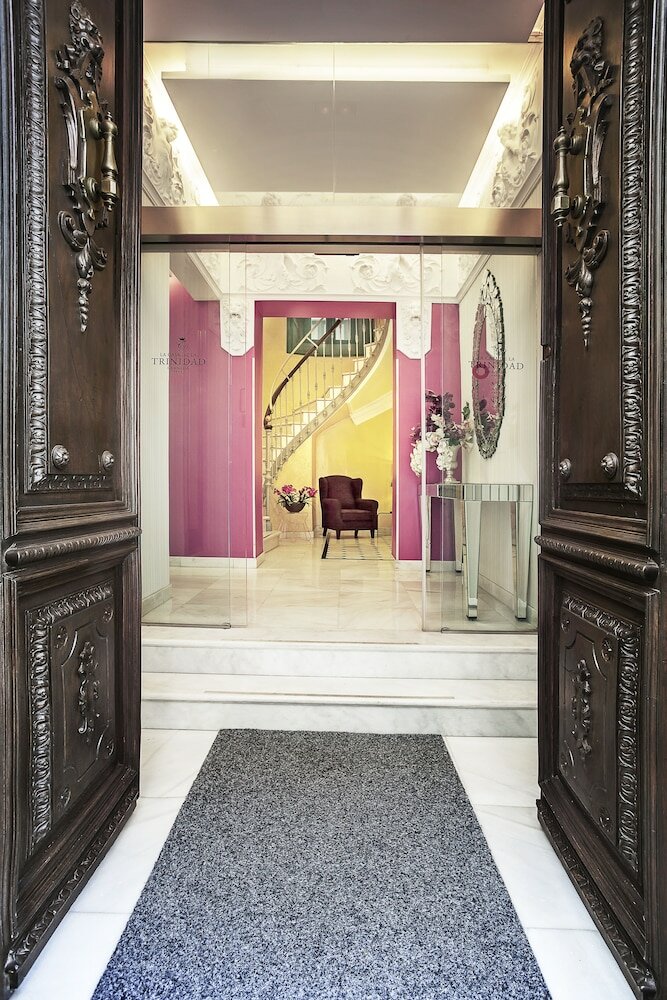 Фото La Casa de La Trinidad Hotel