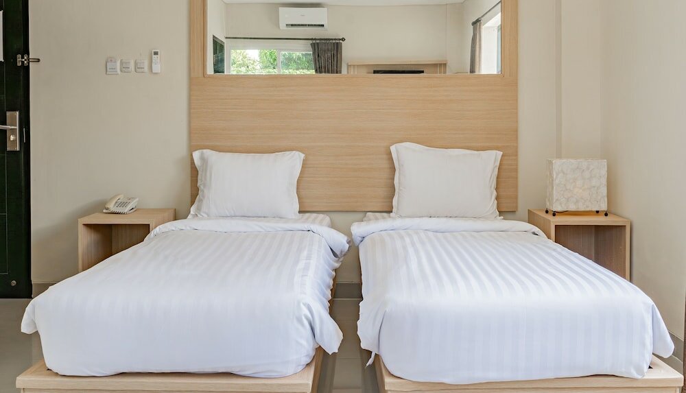 Фото Kuta Airport Insta Hotel