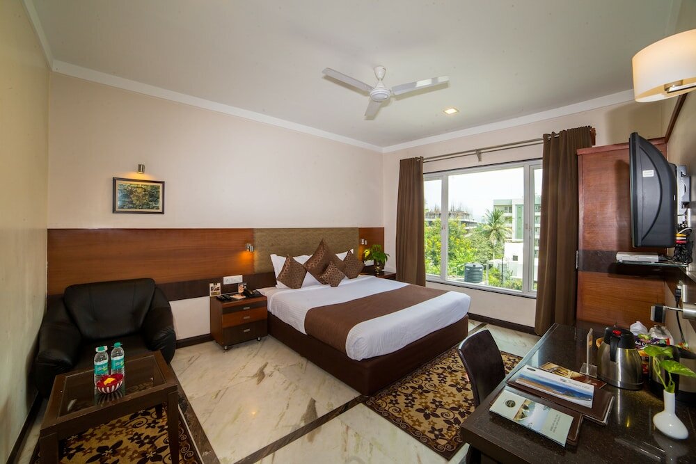 Фото Amantra Comfort Hotel