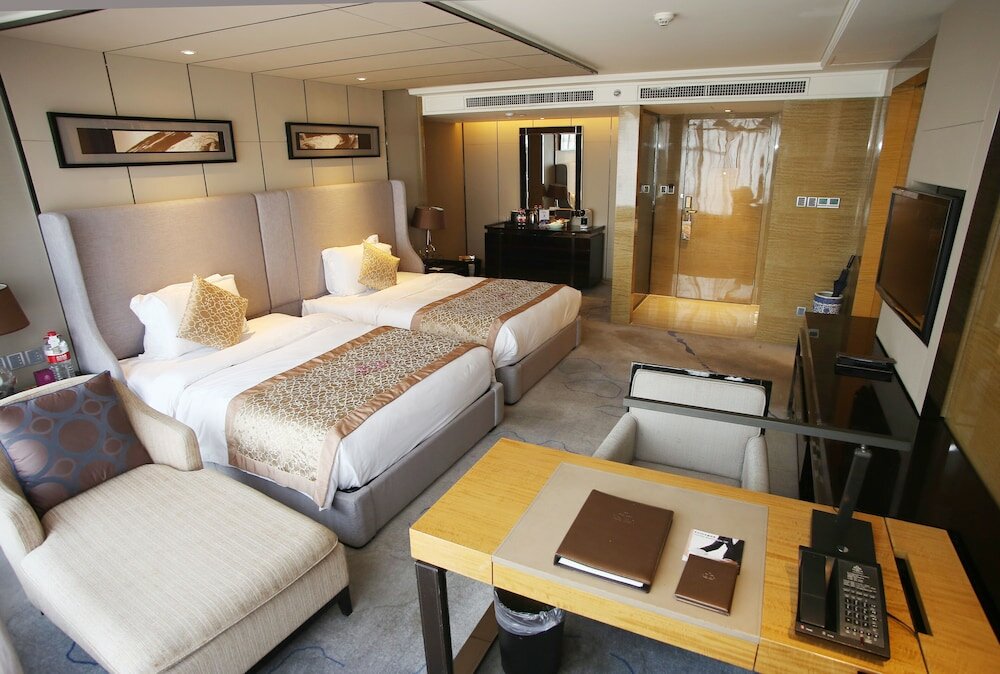 Фото Tangla Hotel Tianjin