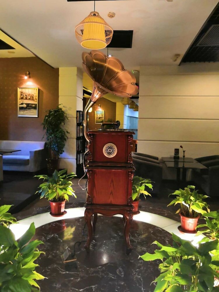 Фото Shanghai Abest Xinshikong Apartments