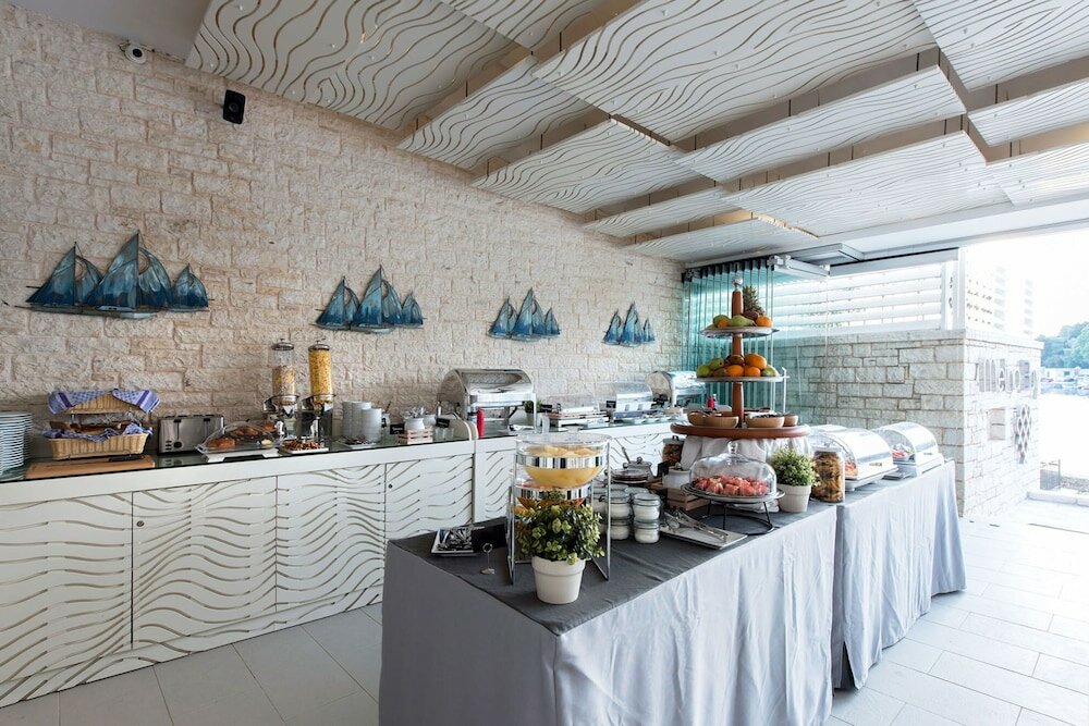 Фото Melina Bay Boutique Hotel