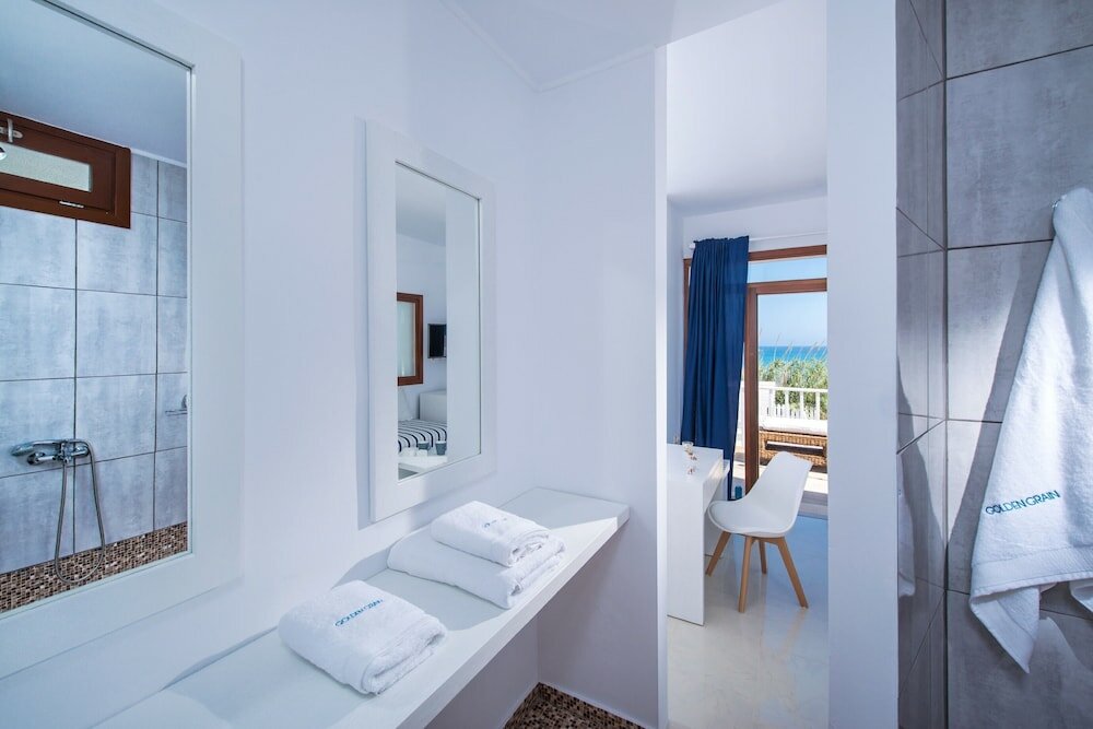 Фото Golden Grain Suites by Checkin