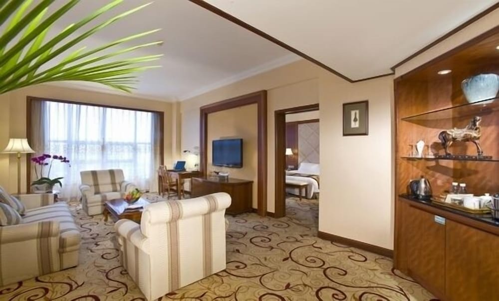 Фото Dongguan Gladden Hotel