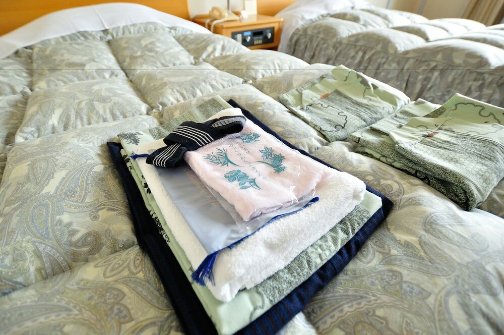 Фото Tateyama Kokusai Hotel