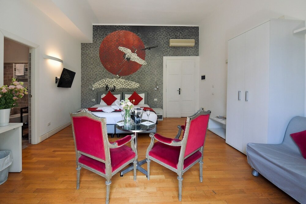 Фото Suites Farnese Design Hotel