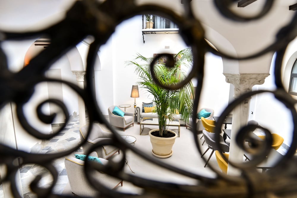 Фото Legado Alcázar Hotel