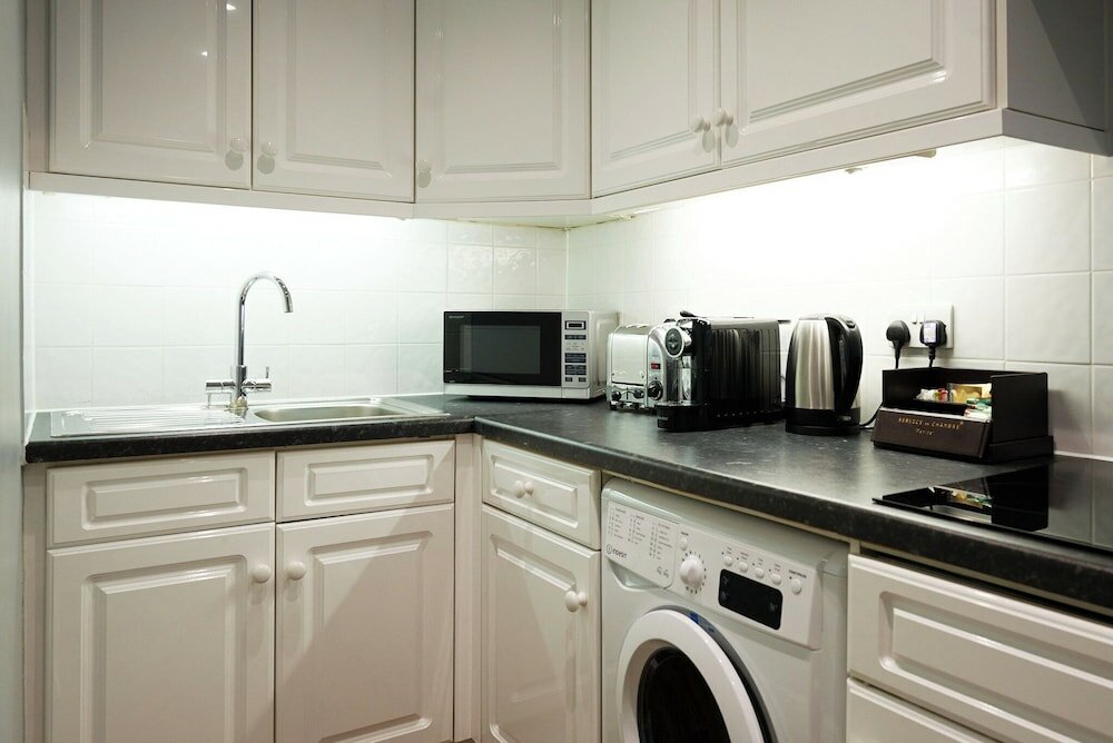 Фото The Capital Hotel Apartments & Townhouse