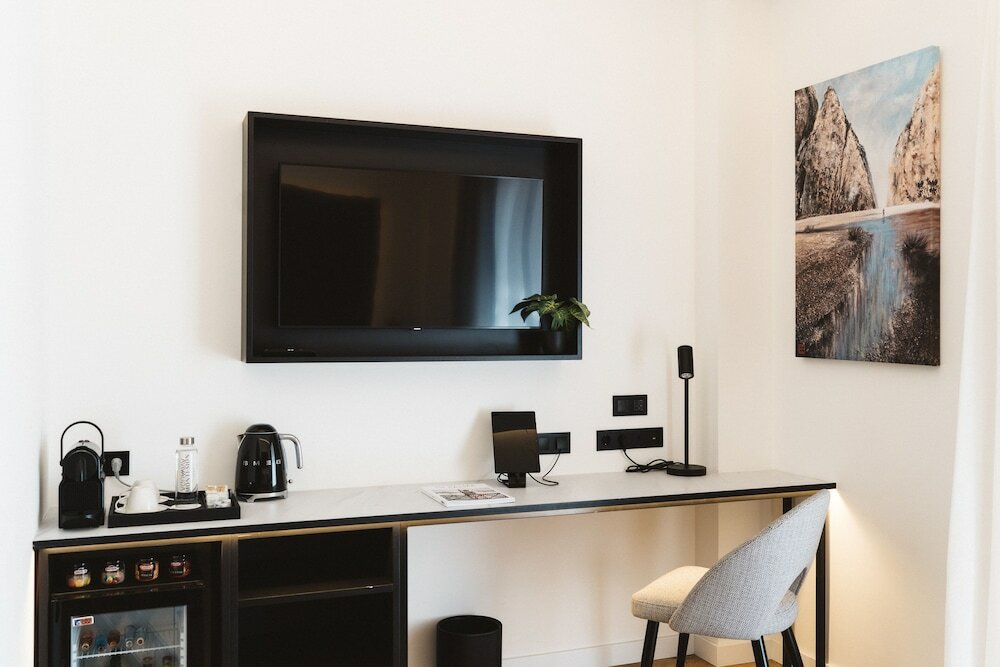 Фото Boutique Hotel Petit Montisión