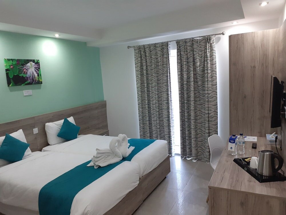 Фото TJ Boutique Accommodation