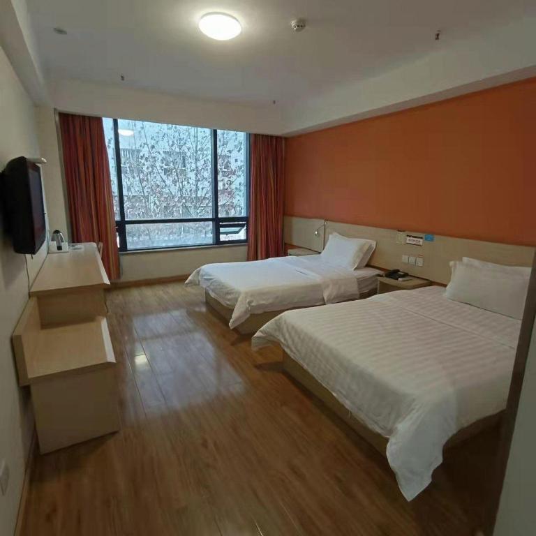 Фото 7Days Inn Chain Hotel Chongqing Wanzhou Gaosuntang Chongbai