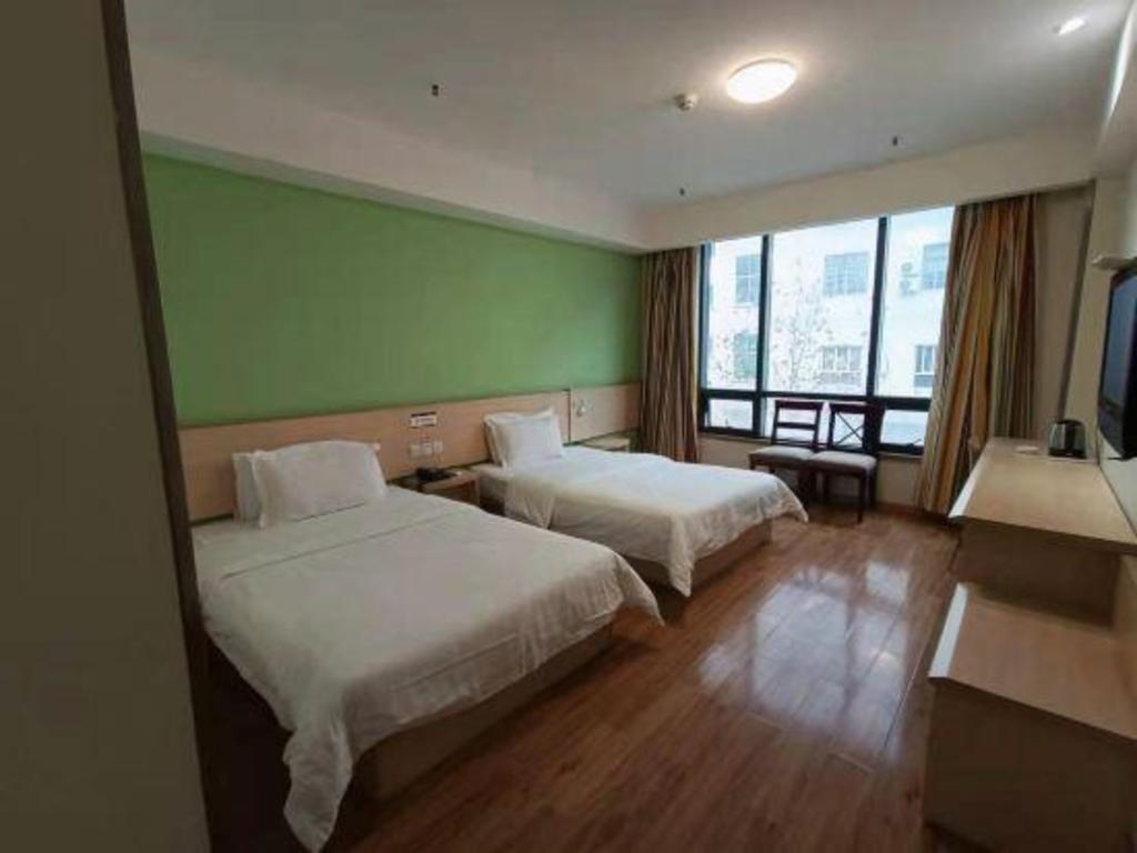 Фото 7Days Inn Chain Hotel Chongqing Wanzhou Gaosuntang Chongbai