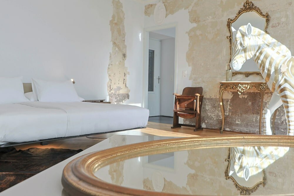 Фото Caffè dell'Arte Boutique Rooms