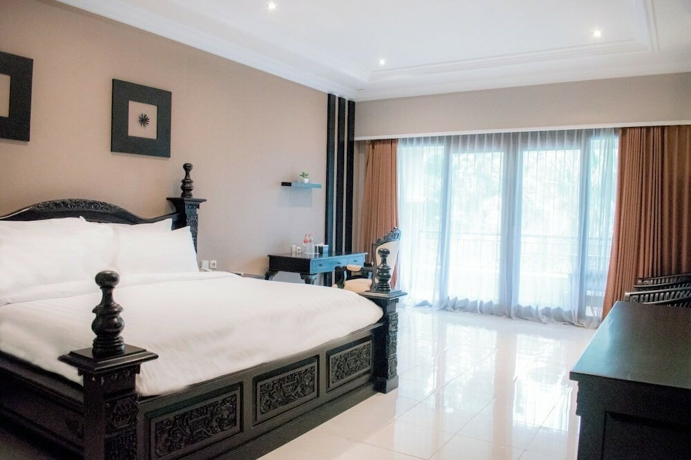 Фото Luminor Hotel Jember